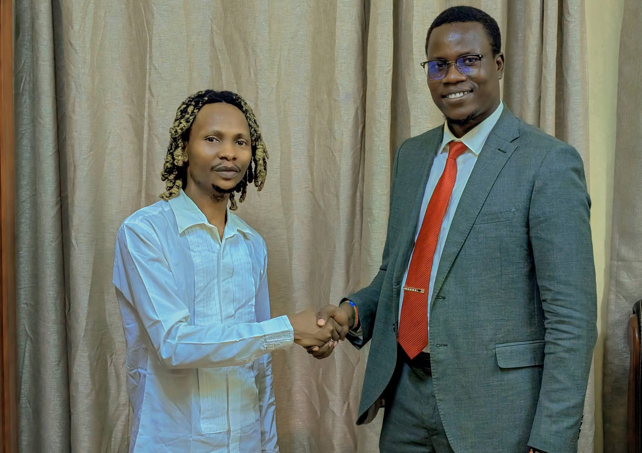 DJ-Cent Mr. No Rest Meets Hon. Bush Buse, Minister of Culture, Youth and Sports DJ-Cent Mr. No Rest Meets Hon. Bush Buse, Minister of Culture, Youth and Sports
